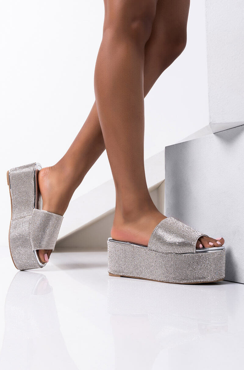 AND ANOTHER ONE SLIP ON FLATFORM SANDAL